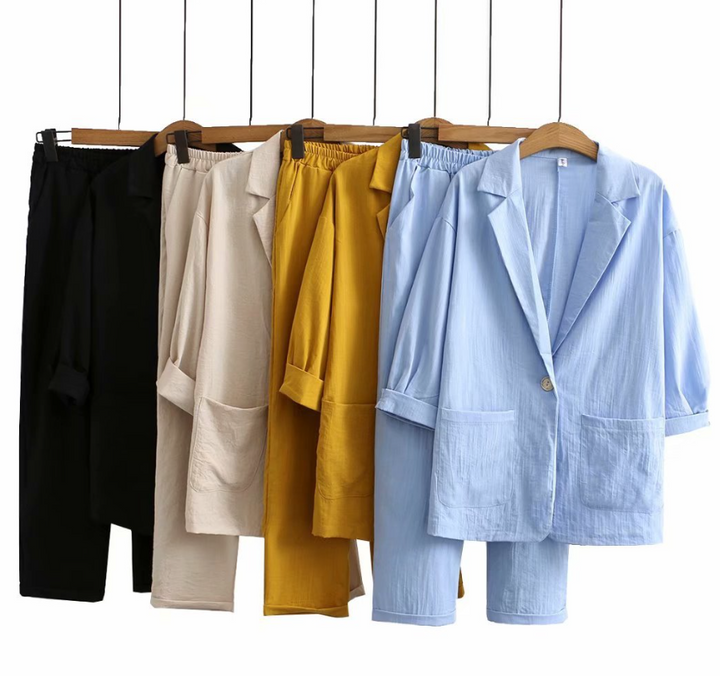 Elegantes Damen Zweiteiler Set mit luftiger Sommerbluse & passender Hose. Ideal für warme Tage.