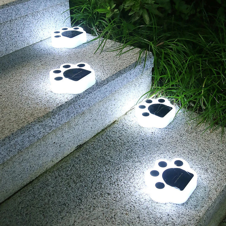 Stimmungsvolle Solar LED Pfotenleuchte für Garten, Wegbeleuchtung & Außenbereiche. Wetterfeste Garten-Dekoleuchte.