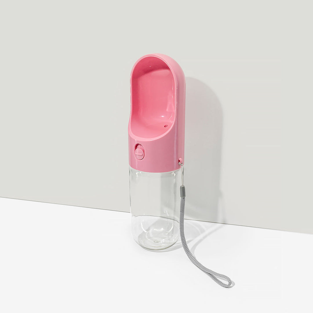 Kompakte 400ml Wasserflasche für Haustiere, mit integriertem Napf, ideal für Wanderungen & Reisen, in Rosa.