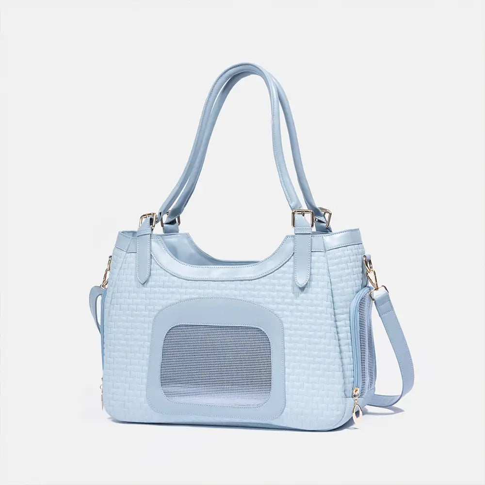 Praktische Reisetasche für Haustiere aus Kunstleder; atmungsaktiv & leicht zu tragen.