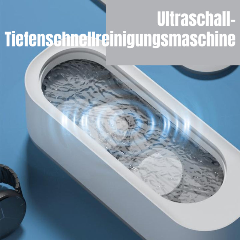 Schmuckreiniger: Tragbarer Ultraschallreiniger entfernt Schmutz von Ringen und Halsketten für Hygiene.