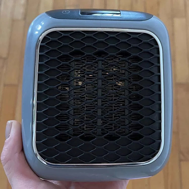Tragbares Heizgerät mit Schnellheizsystem, ein energieeffizienter Mini Heizlüfter für angenehme Raumwärme.
