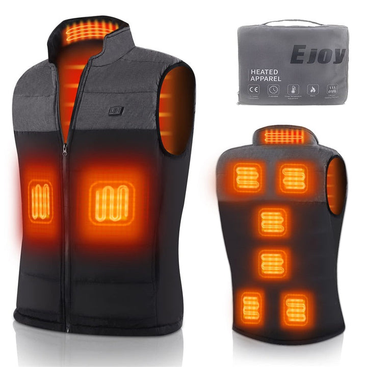 Person trägt schwarze Unisex Graphen Heizweste beim Wandern, USB-beheizt für mobile Wärme im Freien.