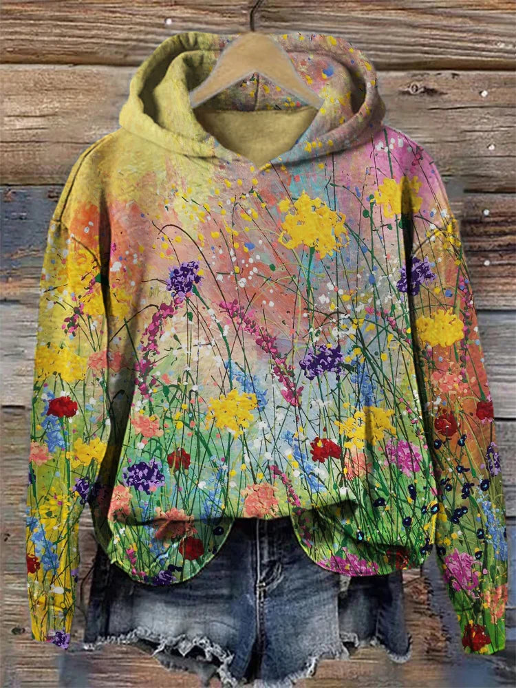 Unisex Künstler Hoodie mit lebendigem Blumenprint. Farbfroher, gemütlicher Kapuzenpullover, ganzjährig tragbar.