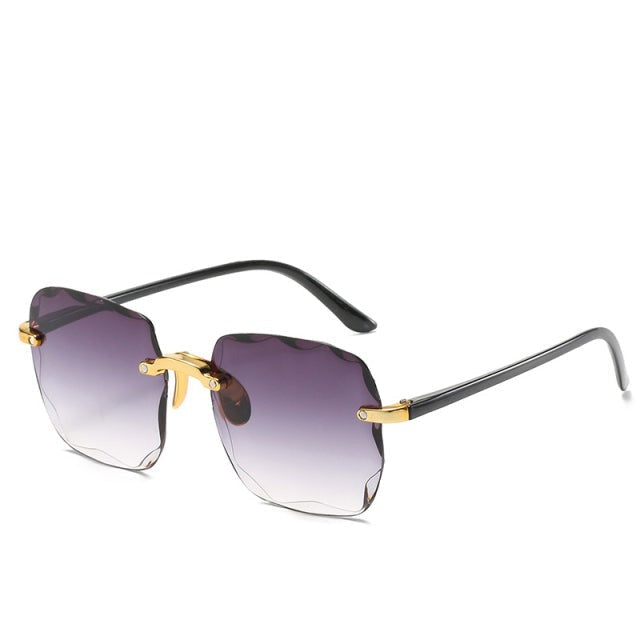 Trendige, randlose Unisex-Sonnenbrille in Vintage-Optik. Stilvoller UV400-Schutz für die Augen.