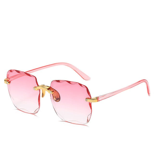 Modische Unisex Sonnenbrille (randlos) in Vintage-Optik. Verfügbar in verschiedenen Farben mit UV400-Schutz.