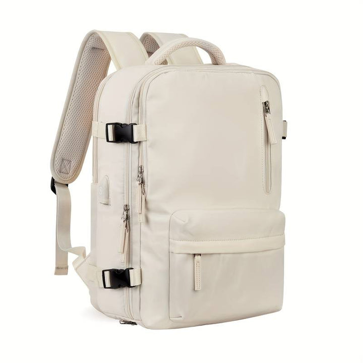 Beiger Unisex Reiserucksack mit separatem Schuhfach und vielen Fächern, wasserdicht.