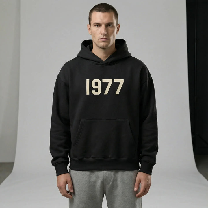 Herren & Damen Kapuzenpullover mit 1977 Vintage-Motiv, Raglan-Ärmeln und weicher Qualität.