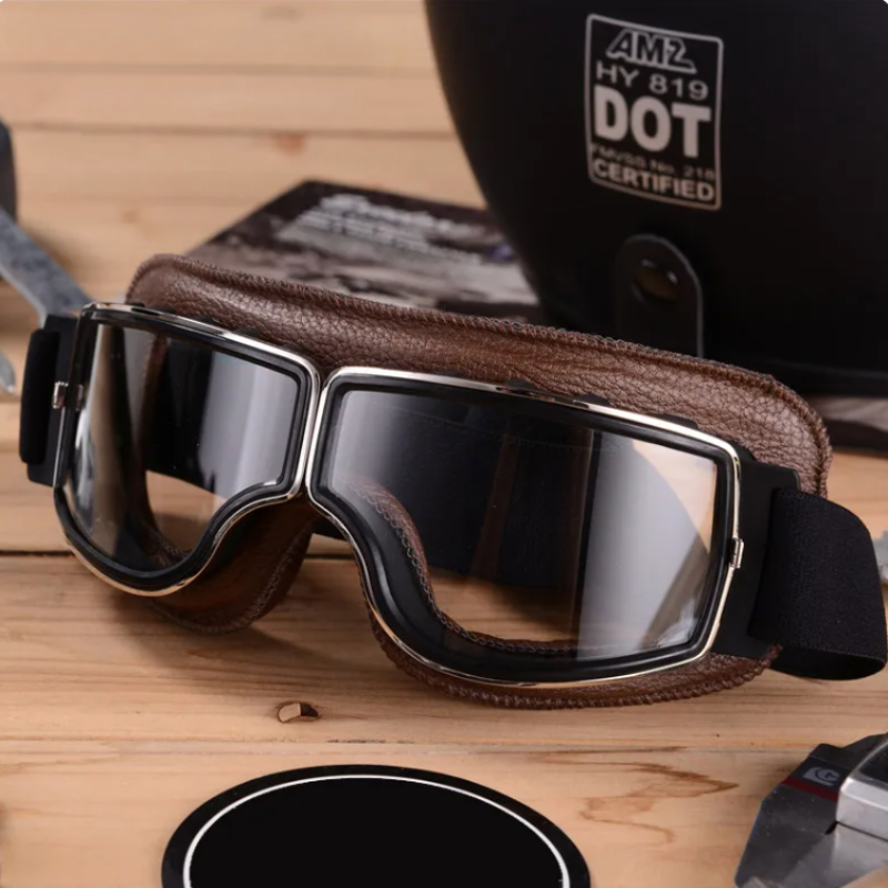 Unisex Vintage Motorradbrille mit braunem Lederriemen, ideal für stilvolle Retro-Motorradfahrten und Augenschutz.