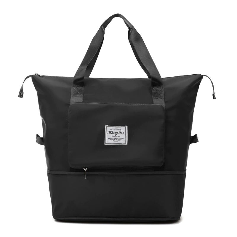 Organisierte Wochenendtasche mit vielen Fächern. Praktisches wasserdichtes Handgepäck für Ordnung auf Reisen.
