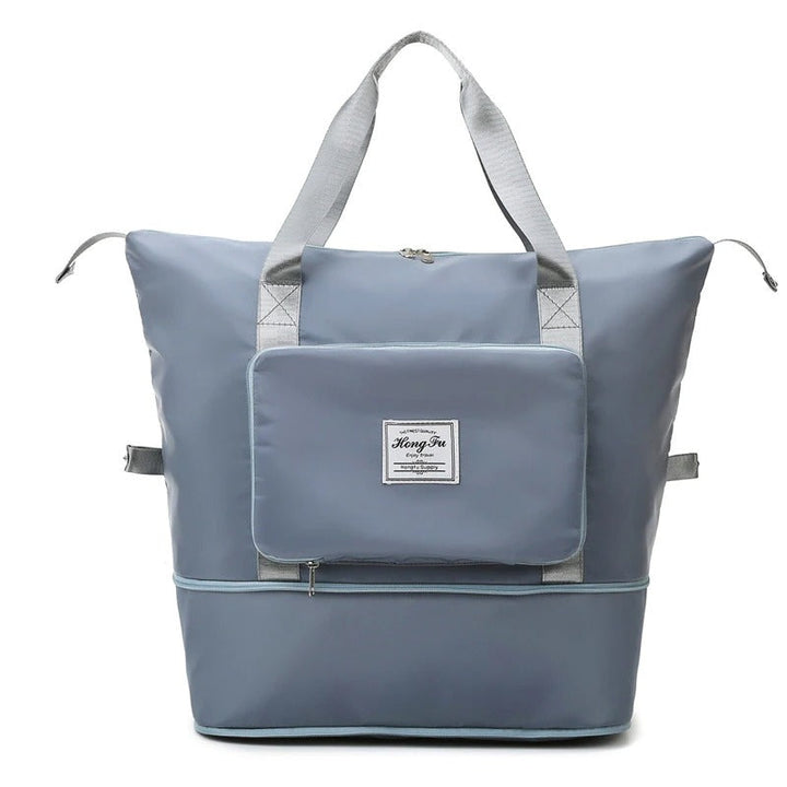 Kompakte faltbare Reisetasche, wasserdichtes Design. Spart Platz im Gepäck, ideal als Handgepäck.