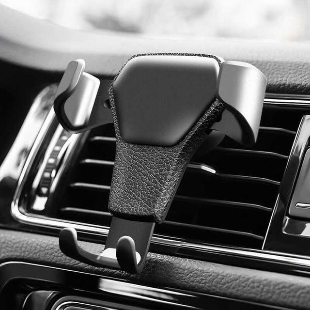 Universelle Schwerkraft Handyhalterung fürs Auto, sicherer Halt für Smartphones, einfache einhändige Bedienung.