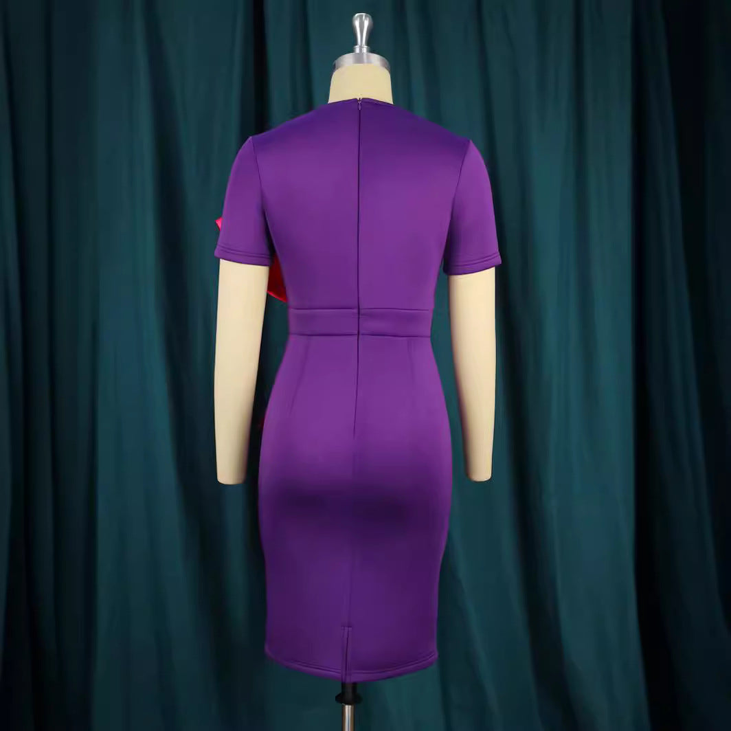 Violettes Damenkleid mit figurbetonter Passform und feinen Rüschen. Perfekt für festliche Gelegenheiten.