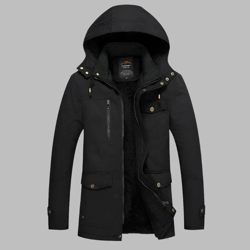 Detailansicht der ArcticShield Herren Winterjacke: Wasserdichtes Material, Reißverschluss & winddichte Manschetten.