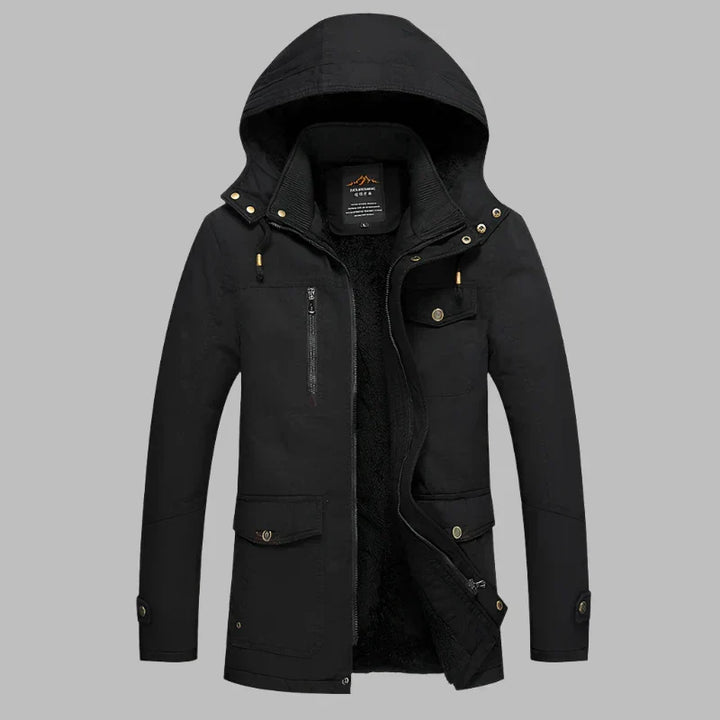 Detailansicht der ArcticShield Herren Winterjacke: Wasserdichtes Material, Reißverschluss & winddichte Manschetten.