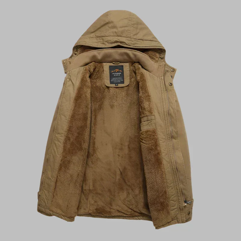 Innenfutter der warmen ArcticShield Herren Winterjacke. Komfortable, wasserdichte Outdoorjacke mit Kälteschutz.