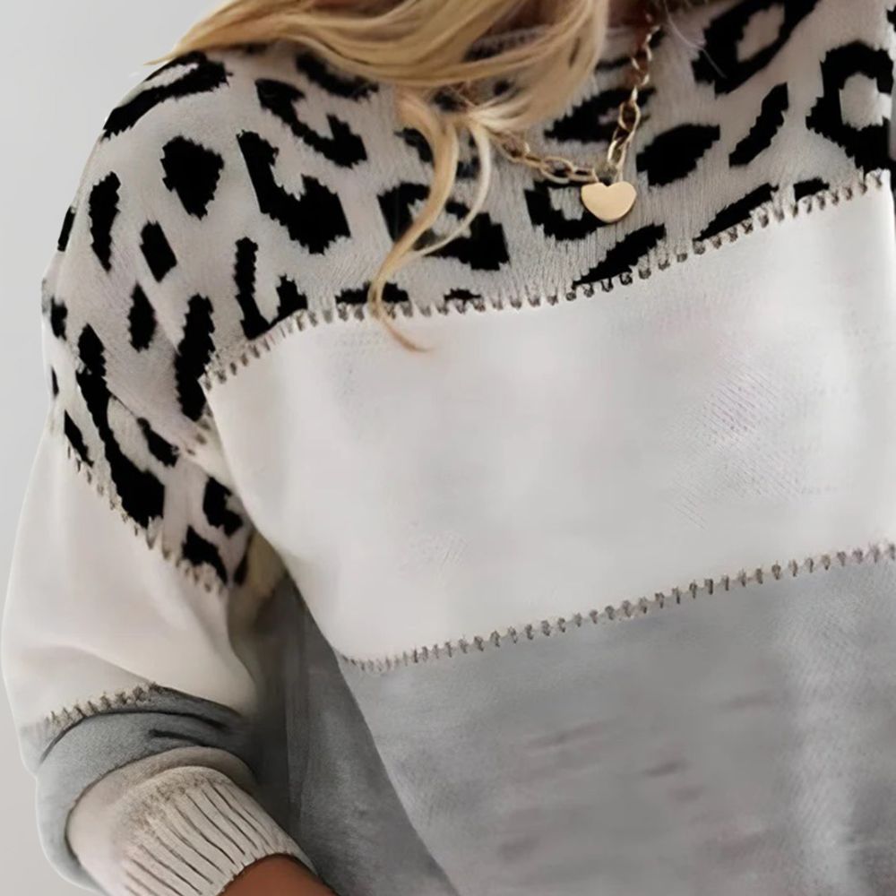 Stilvoller Damen-Pantherprint-Pullover, langärmlig. Trendiges Oberteil für einen modernen Herbst-/Winter-Look.