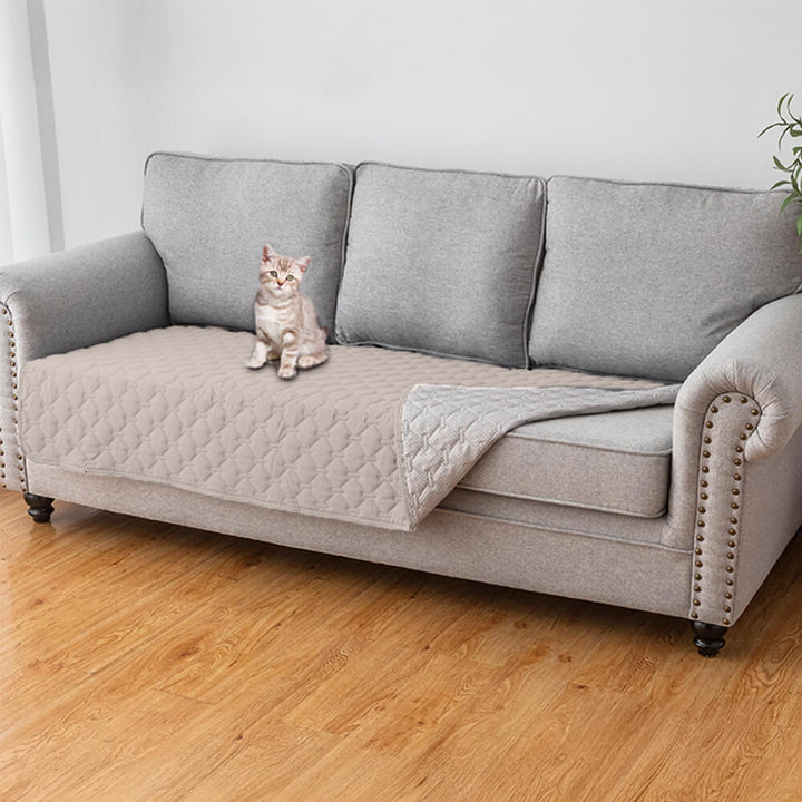 Eleganter wasserdichter Sofabezug mit Rautensteppung, schützt Ihre Couch vor Haustieren.