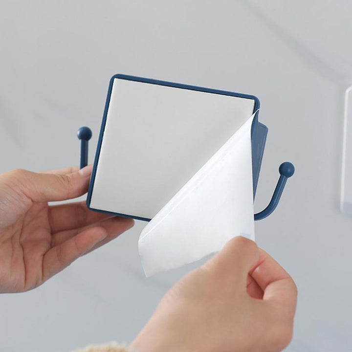 Praktische Wandhalterung für Handy & Fernbedienung im Bad; ideal für Organisation & griffbereite Ablage.