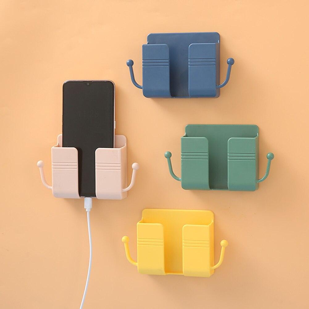 Flexible wandmontierte Aufbewahrungsbox für Handy, Fernbedienung & Kleinigkeiten in jedem Raum.