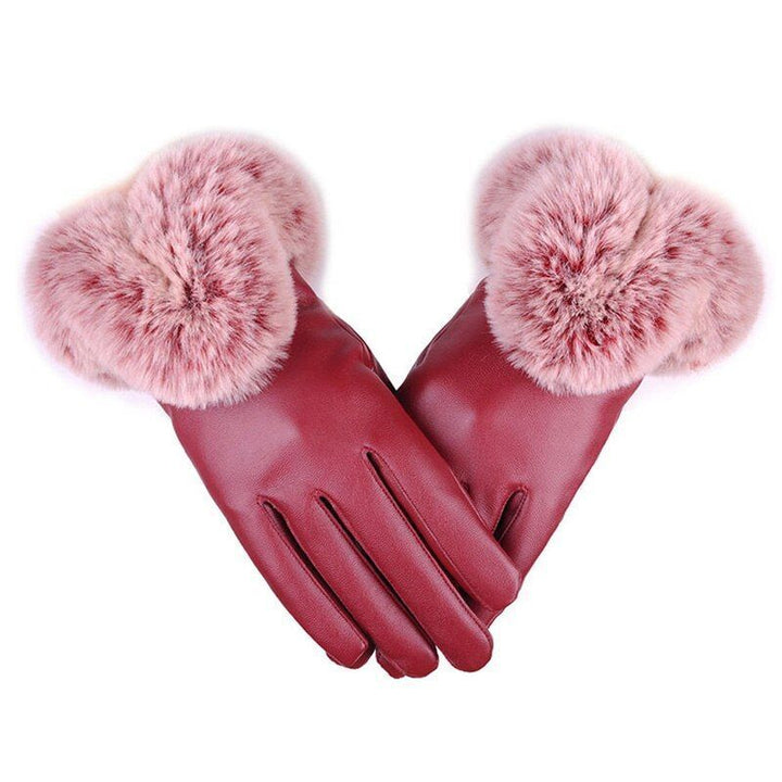 Schwarze Damen Winterhandschuhe mit Touchscreen-Funktion. Warm, stilvoll und praktisch.
